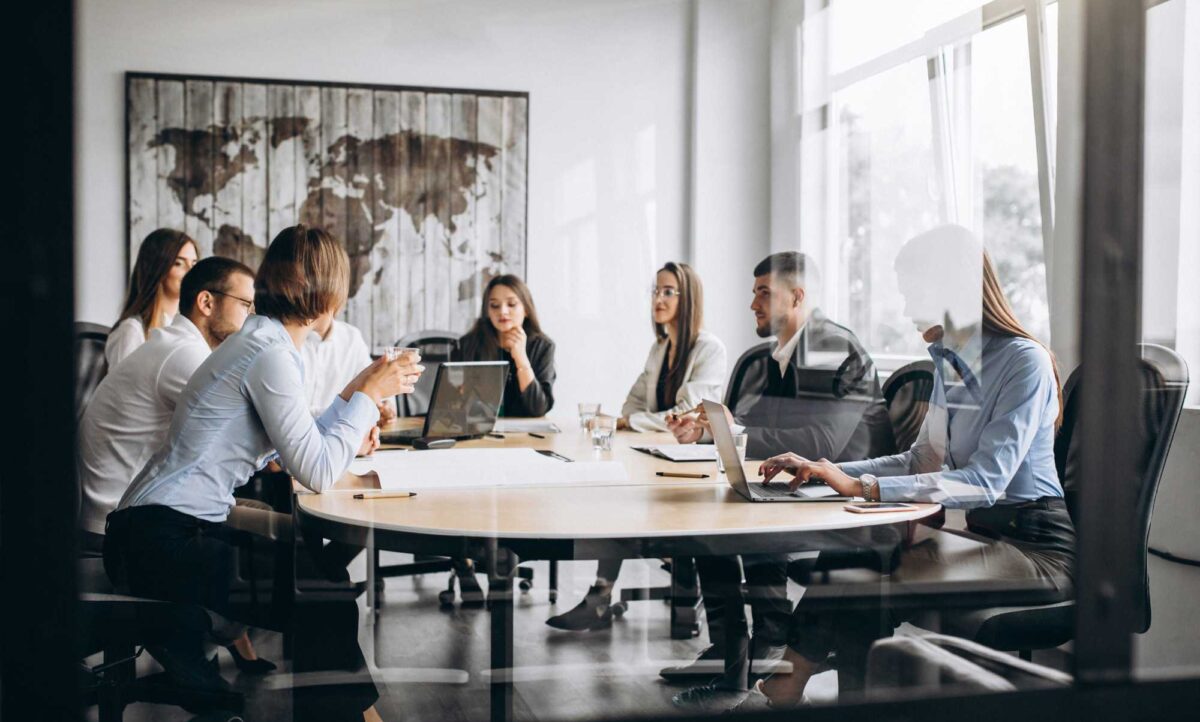 group-people-working-out-business-plan-office