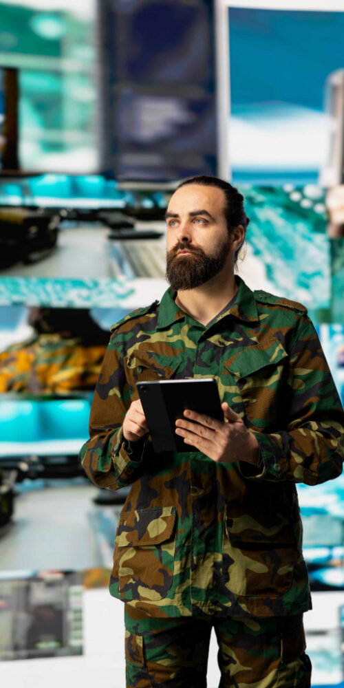 young-soldier-working-command-center-with-satellite-surveillance